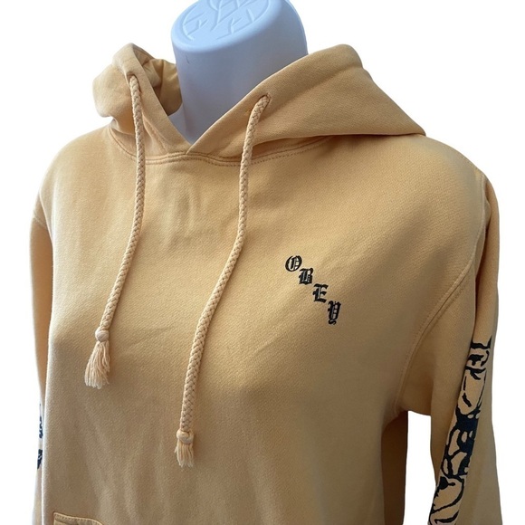 OBEY Yellow Hoodie with Black Rose Graphic Detailing on Sleeves Size Small - Picture 2 of 7